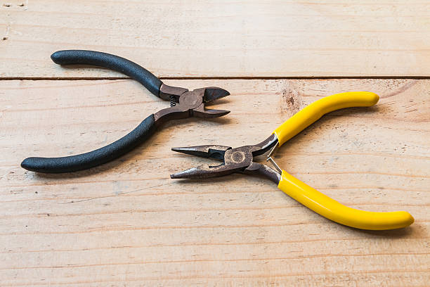 istock Old wirecutters and  pliers on the wood 469590694