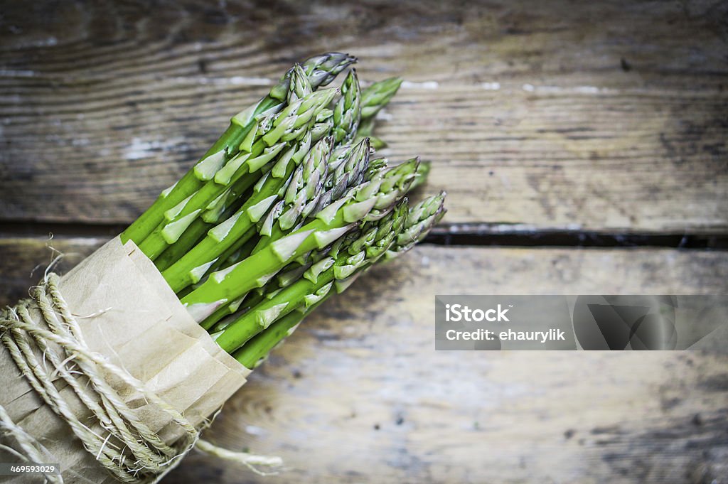 Asparagus on rustic wooden background Asparagus Stock Photo