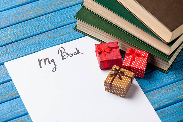istock Gift boxes, books and paper with My Book words 469597084