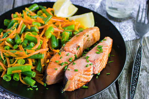istock salmon with green beans and carrot 469597290