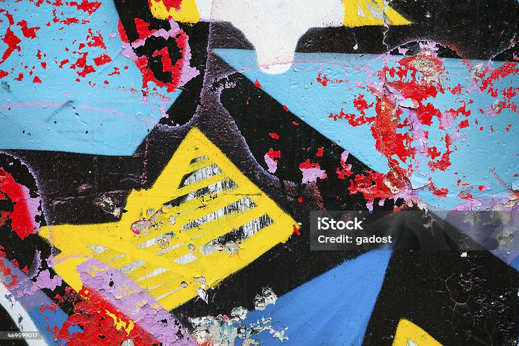 Colorful wall texture Closeup of damaged colorful graffiti Color Block Stock Photo