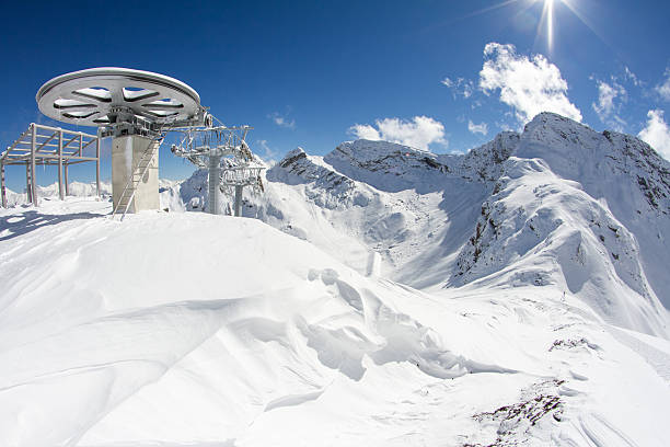 istock ski lift chairs in the mountains 469600331