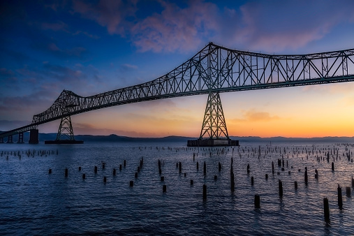 The Astoria Megler Bridge is a steel cantilever through truss bridge that spans the Columbia River between Astoria, Oregon and Point Ellice near Megler, Washington, in the United States
