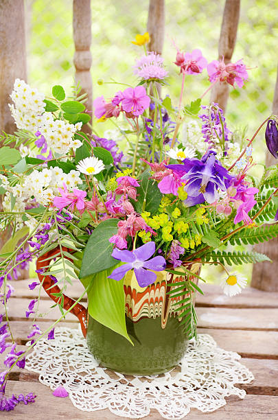 istock vase with beautiful  spring forest  flowers 469600744