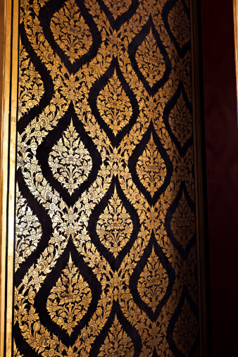Thai art wall pattern on wood door