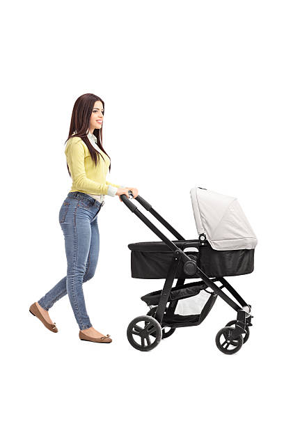 istock Young mother pushing a baby stroller 469606896