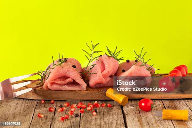 Raw Turkey Meat Stock Photo - Download Image Now - Backgrounds, Barbecue - Meal, Cherry Tomato