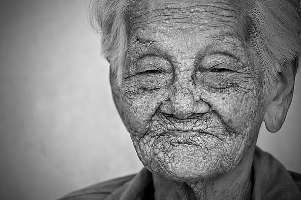 istock old woman happy , 469608371