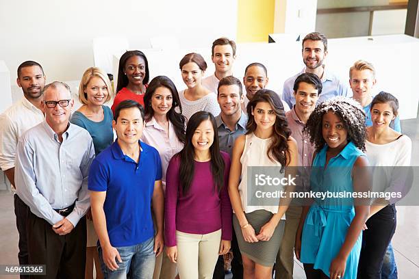 Portrait Of Multicultural Office Staff Standing In Lobby Stock Photo - Download Image Now