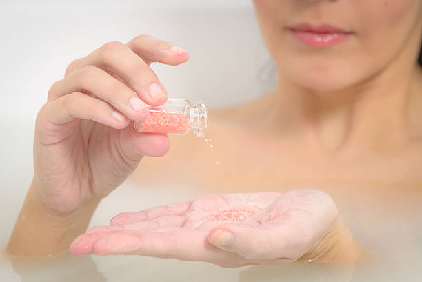 istock Woman enjoying a therapeutic aromatherapy bath 469613913