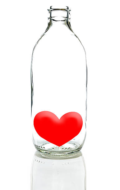 istock Glass bottom with red heart 469616865
