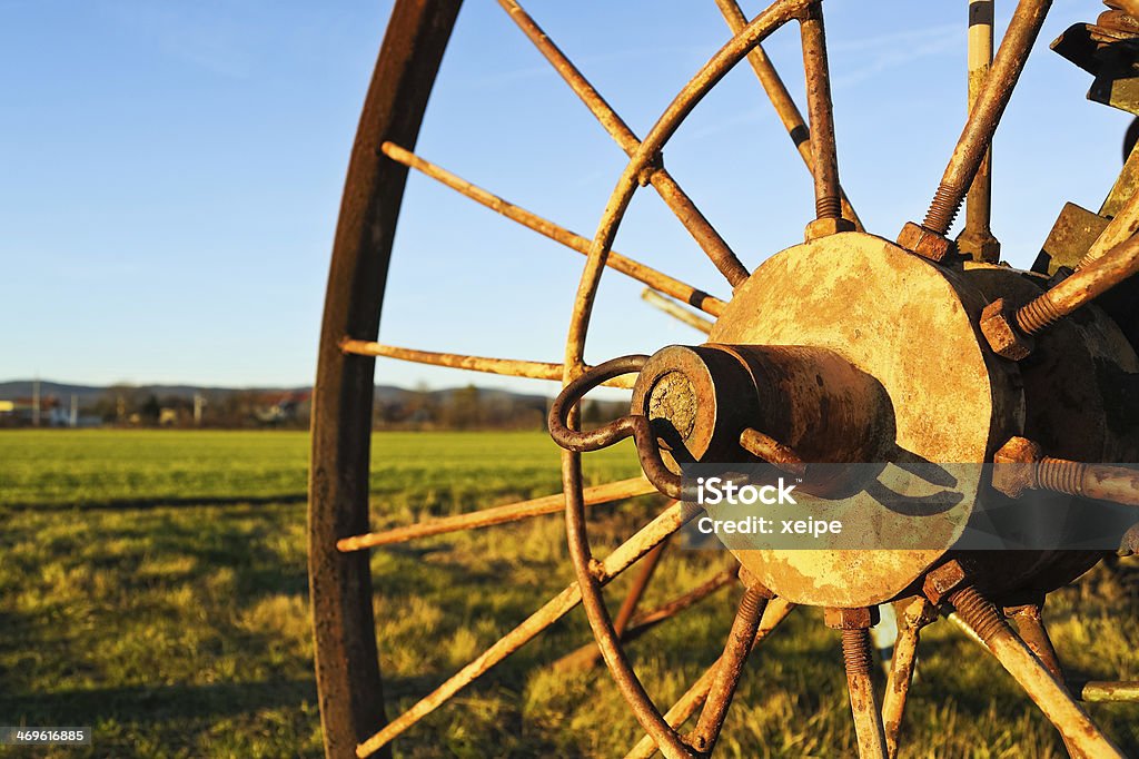 wheel of an old Tedder Agriculture Stock Photo