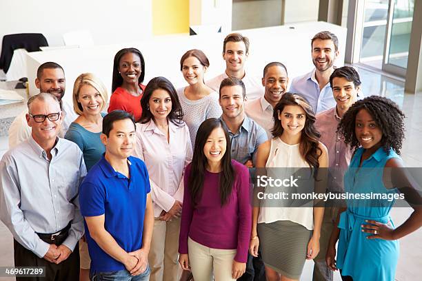 Portrait Of Multicultural Office Staff Standing In Lobby Stock Photo - Download Image Now