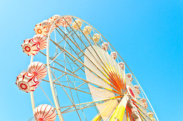 istock ferris wheel and blue sky 469617661