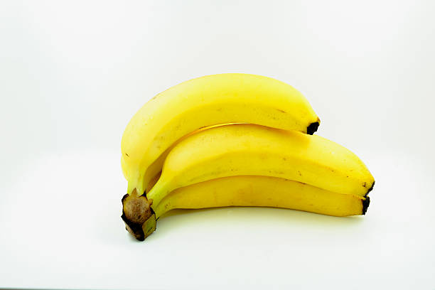 istock Bunch of bananas isolated on white background 469623204
