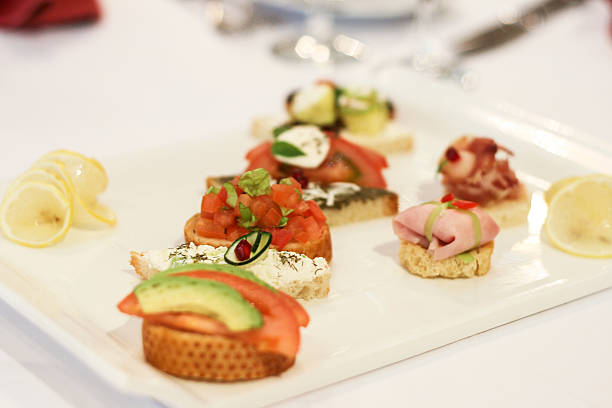 istock Bruschetta with cheese, tomatoes and foie gras pate 469624129