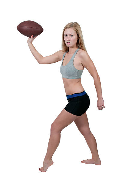istock Woman Playing Football 469632123