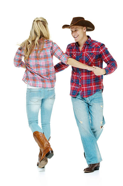 istock Cowboy couple country dancing 469637660