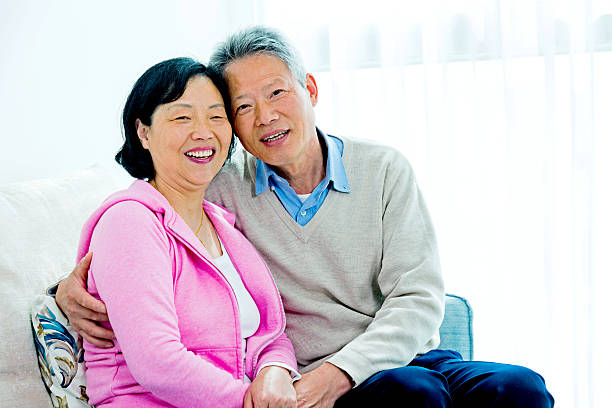 istock Happy senior asian couple 469637880