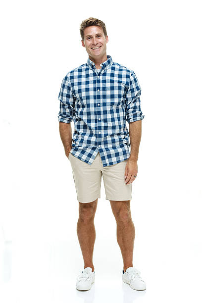 istock Smiling casual man standing and looking at camera 469638522