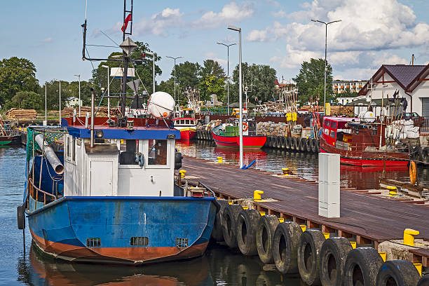 Small fishing boats moored in a marina, Kolobrzeg, Poland