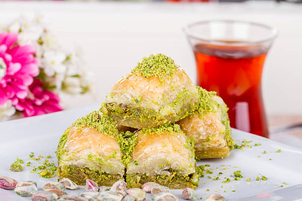 Traditional Turkish Arabic Dessert - Baklava with Honey and Nuts stock photo