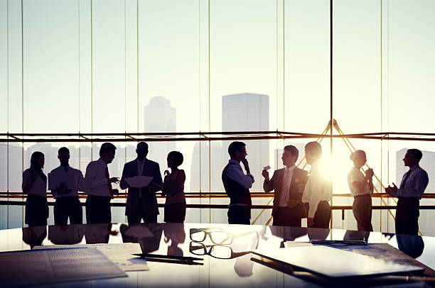 Group of business people discussing in the office  business relationship stock pictures, royalty-free photos & images