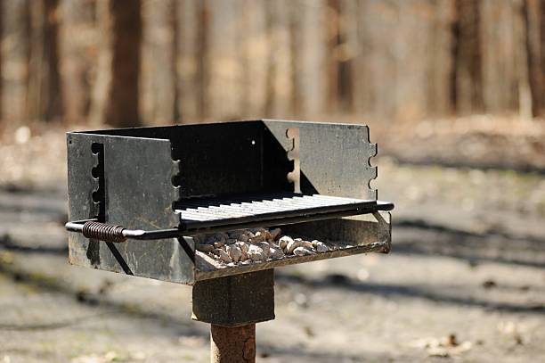 istock Heavy duty barbeque grill with coal ashes 469641926