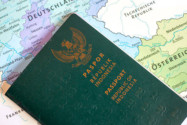Passport Of Republic Of Indonesia Passport of Republic Of Indonesia with map. schengen agreement photos stock pictures, royalty-free photos & images