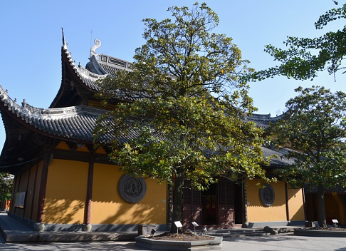 The old Longhua Temple, on a sunny day, a Buddhist Temple dedicated to the Maitreya Buddha. It is the largest, most authentic and ancient temple complex in Shanghai.
