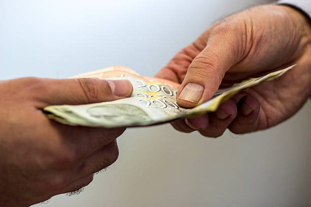 istock Money in the hands 469645572