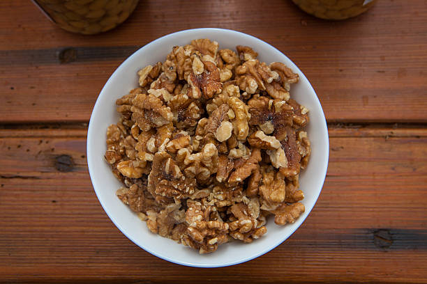 istock bowl of shelled organic walnuts 469645602
