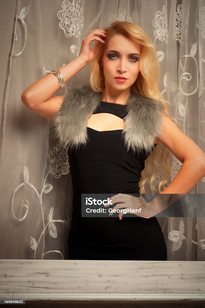 Woman with black Dress Young blonde woman with a black Dress 20-24 Years Stock Photo