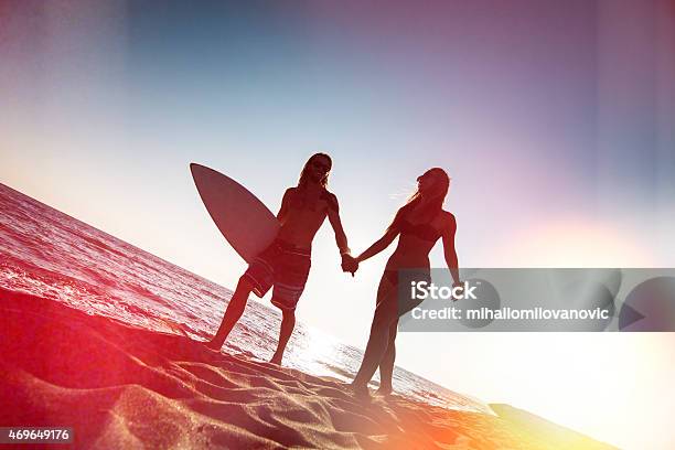 Couple On The Beach Stock Photo - Download Image Now - 2015, Adult, Adults Only