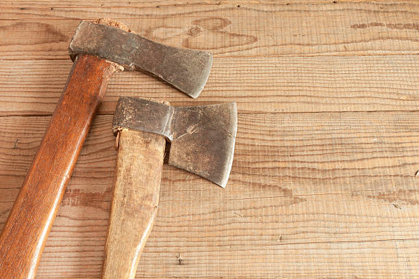 istock Two dated and used cleavers on wooden background 469652200