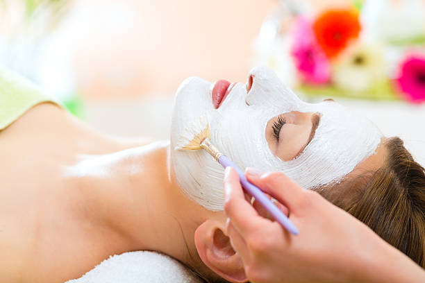 istock Women with a face mask at a spa 469653197