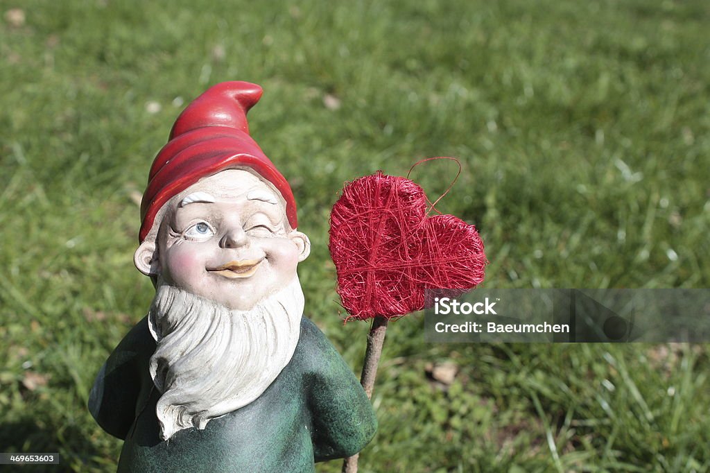 garden gnome Garden gnome with heart Close To Stock Photo