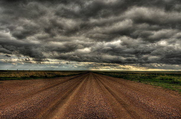 istock dusty dirty country road 469658437