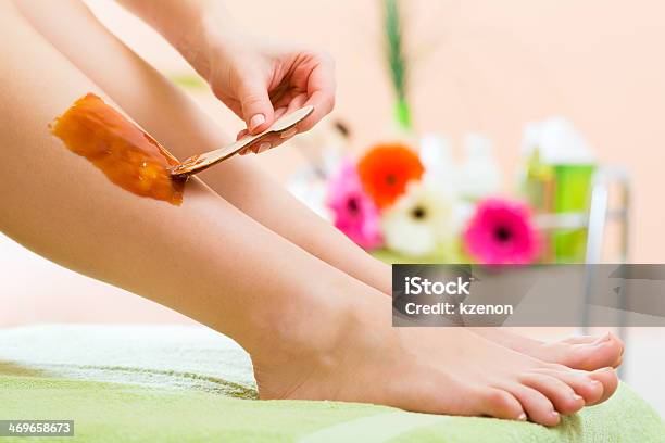 Woman In Spa Getting Leg Waxed For Hair Removal Stock Photo - Download Image Now - Adult, Adults Only, Beautician