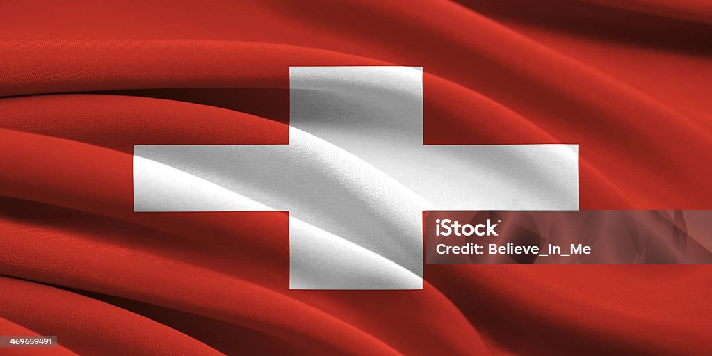 Flag of Switzerland Flag of Switzerland waving in the wind Albania Stock Photo