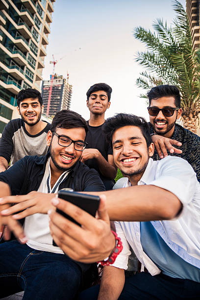 istock Friends taking a selfie in Dubai Marina during a vacation 469666384