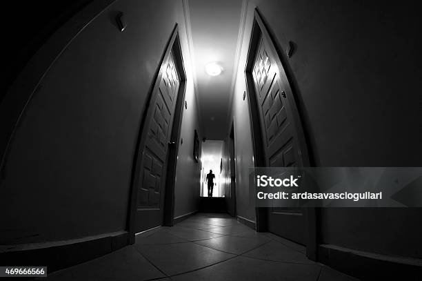 Silhouette In Corridor Stock Photo - Download Image Now - Fish-Eye Lens, Motel, Mystery