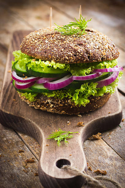 istock Vegan rye burger with fresh vegetables 469666930