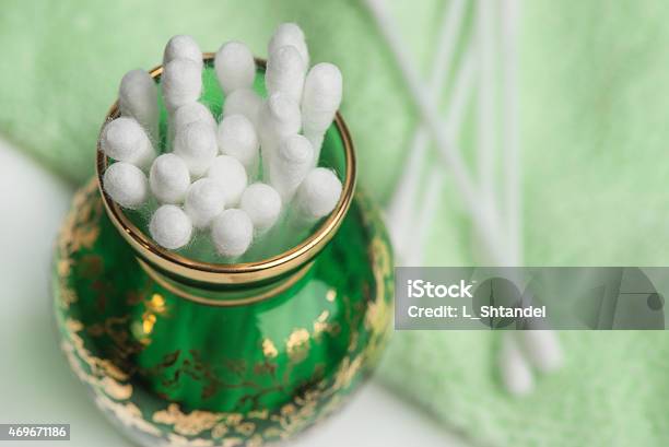 Cotton Swabs In A Green Glass Vase Stock Photo - Download Image Now - 2015, Beauty, Body Care