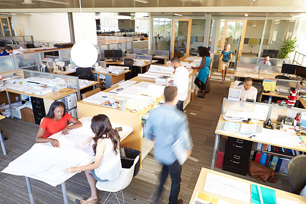 istock Interior Of Busy Modern Open Plan Office 469672327