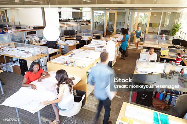 Interior Of Busy Modern Open Plan Office Stock Photo - Download Image Now - Open Plan, Desk, Office