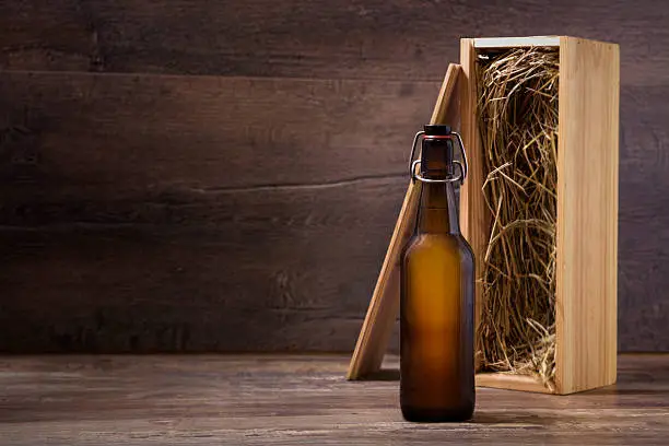 Photo of Craft beer bottle with a wooden gift box
