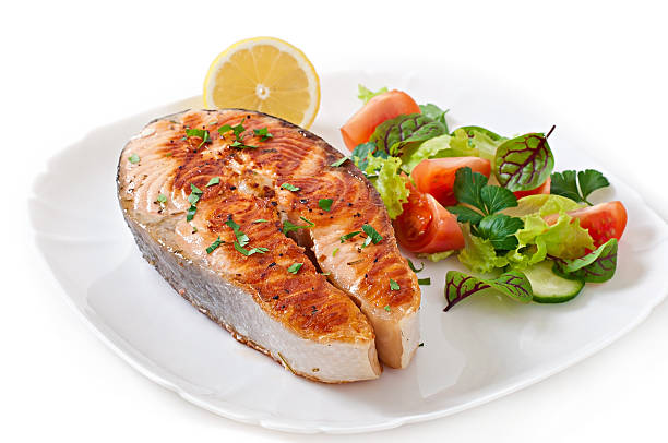 istock Grilled salmon with salad 469672684