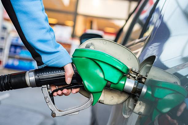 istock Punping gas at gas station. 469673012