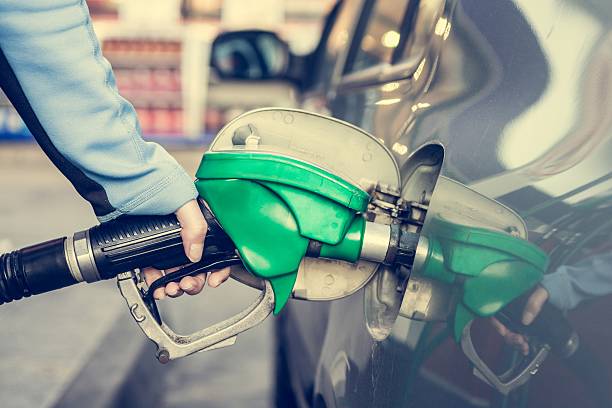 istock Punping gas at gas station. 469673014